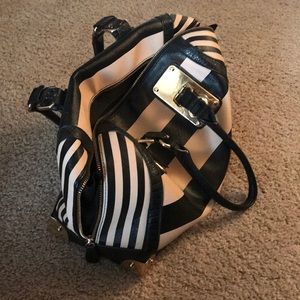 Aldo purse. Black and pinkish stripes